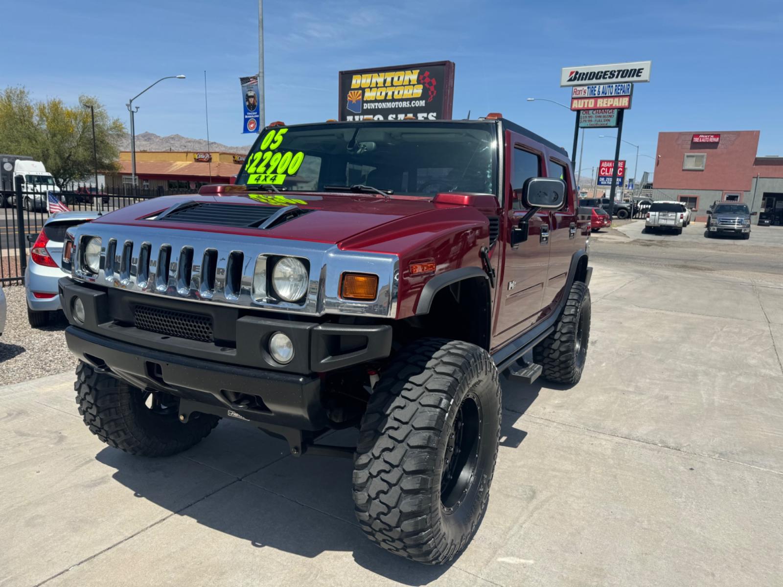 2005 Red /black Hummer H2 SUT , located at 2190 Hwy 95, Bullhead City, AZ, 86442, (928) 704-0060, 0.000000, 0.000000 - 2005 Hummer H2 SUT. only 92k miles. 6.0 V8 4 wheel drive. New transmission with warranty. New shocks. lots of extras .onstar. backup camera, custom stereo. fabtech 6 in lift with 40 in tires. Big Bad Hummer. $22900. Free and clear title. - Photo #2